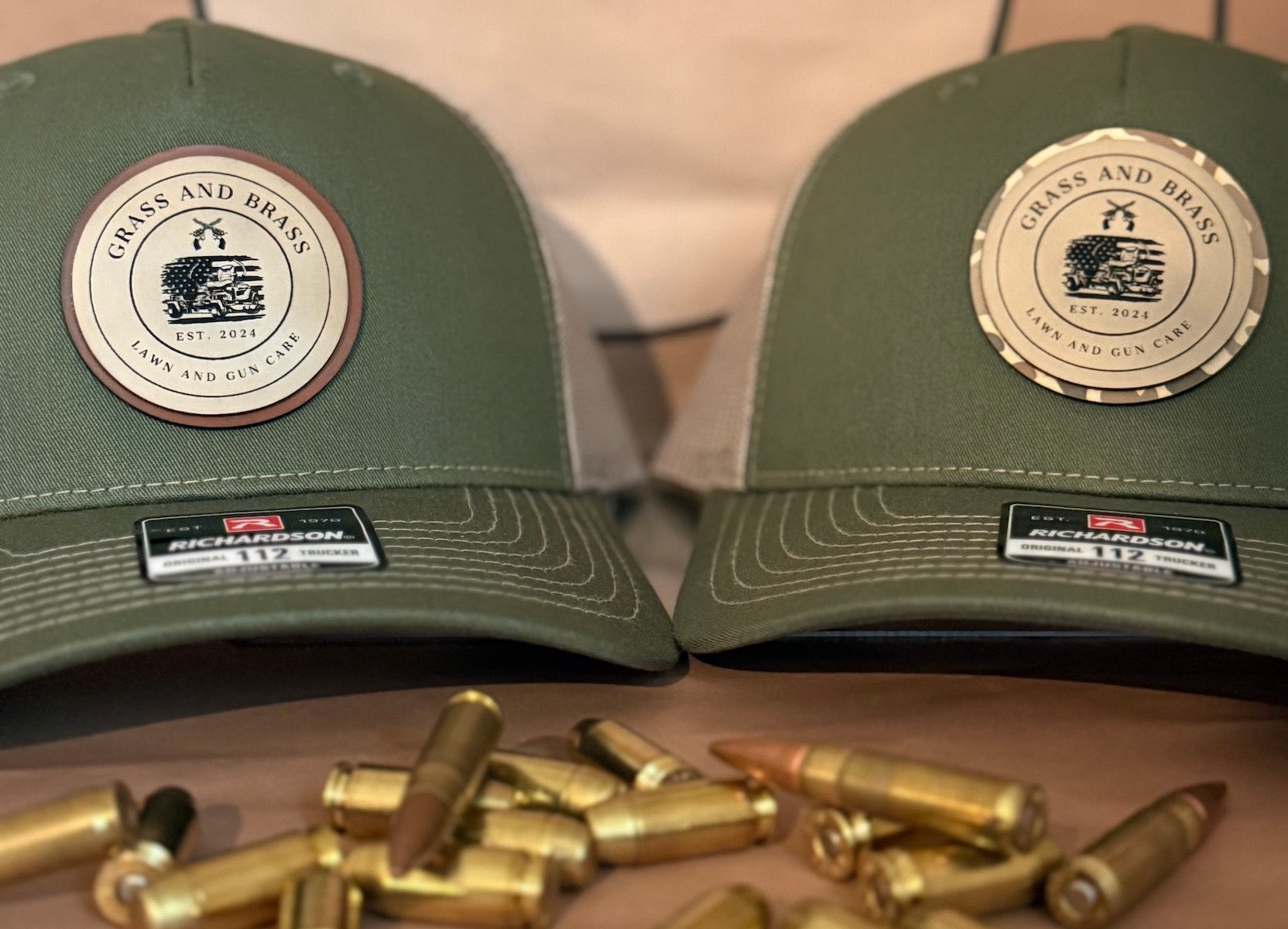 Two green caps with custom branding